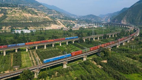 Chinese freight trains near Yuanlong, source: Wikipedia
