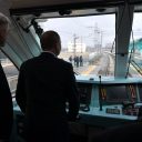 Russian President Vladimir Putin travels aboard a rail-bus from Kerch to Taman before the opening ceremony of the railway part of the Krymsky, source: ANP