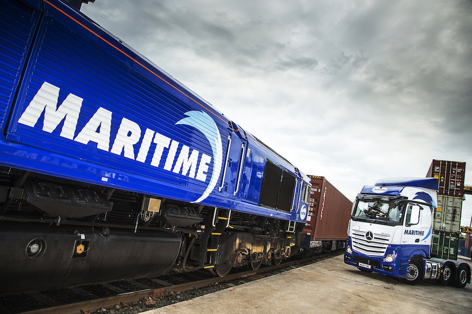 Maritime locomotive and Mercedes truck stand side by side