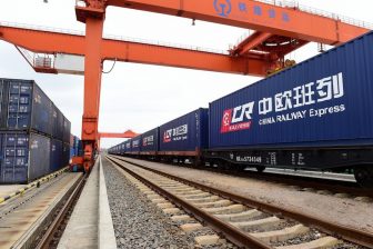 Image of railcard in China with intermodal containers