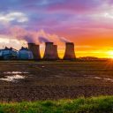Drax power station at sunset with marshland in foreground