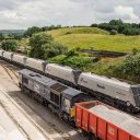 Cemex trains passing each other near Dove Holes