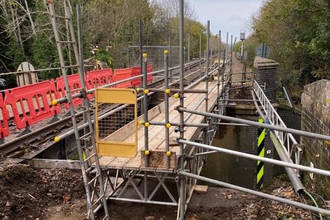 Repair work at Forster's Bridge in Ketton showing scaffolding and demolished track section