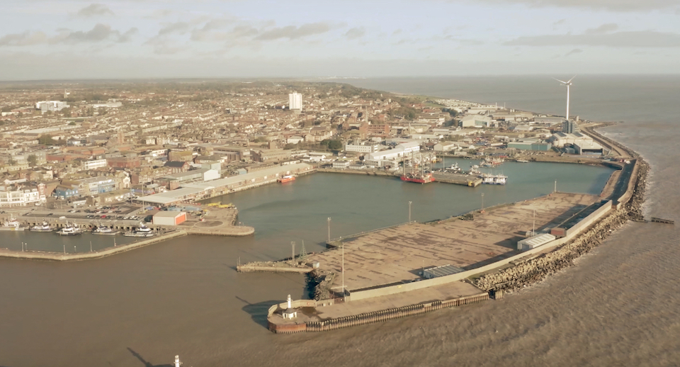 View from the air of Lowestoft port showing harbour and the town beyond