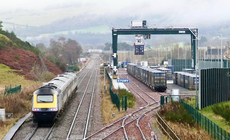 High Speed Train passes intermodal at Blackford in the Scootish highlands
