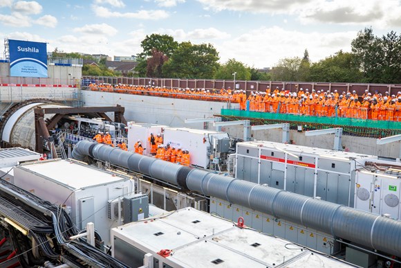 Tunnel Boring machine Sushila and workers in orange safety uniforms