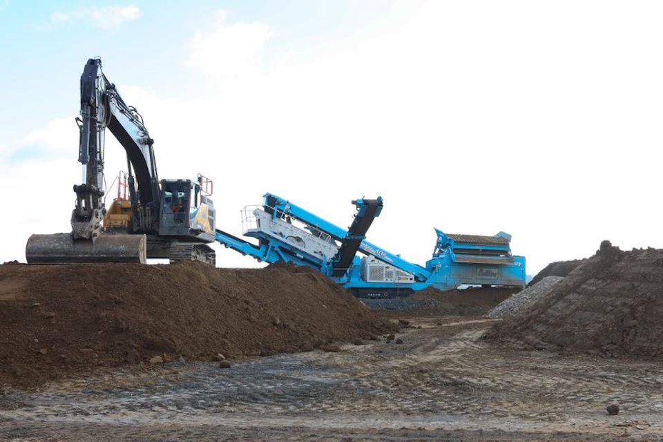 Diggers and land remediation equipment on site at Northampton rail freight park