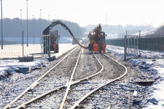 Rail and road mounted track laying vehicles working on sidings at the SEGRO Logistics Park Northampton development