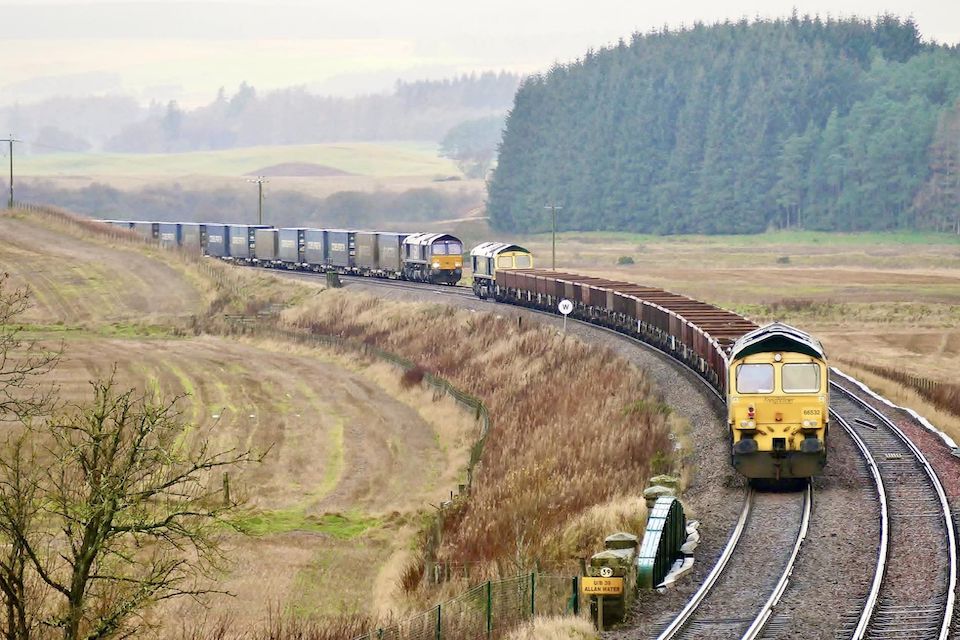 Freight trains crossing in the Scottish Highlands