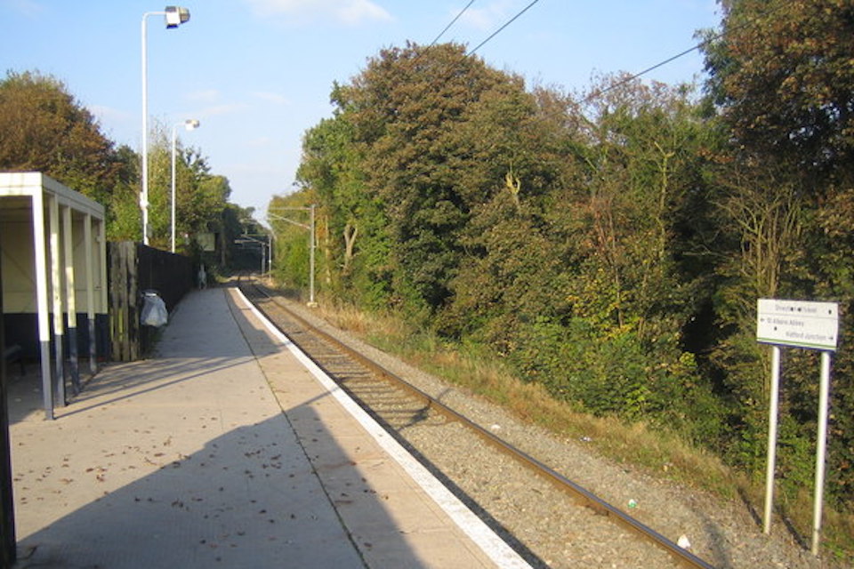 Image a single track railway station