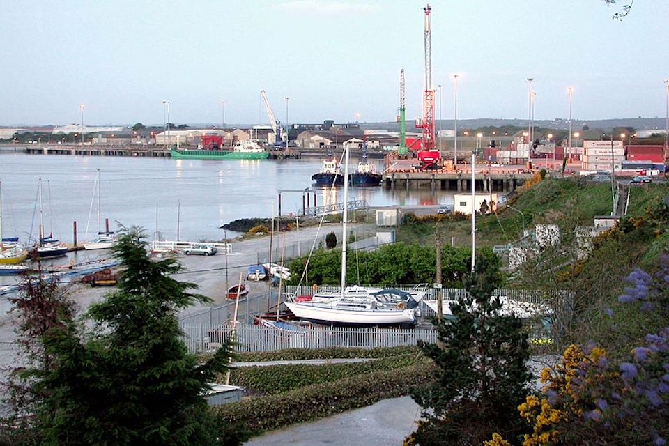 A view over boats in the foreground to ships in the background at Foynes harbour in Ireland