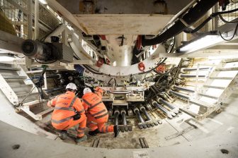 Engineers inside a huge tunnelling machine