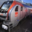 The prototype Euro Dual locomotive from Stadler on display at a trade show