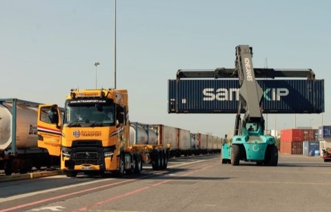 Samskip container being loaded by a reach stacker at Balllina in Ireland