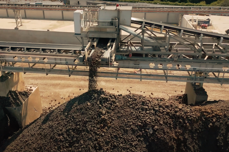 End of the HS2 conveyor delivers a huge stream of earth to a growing pile, ready for trains to take away