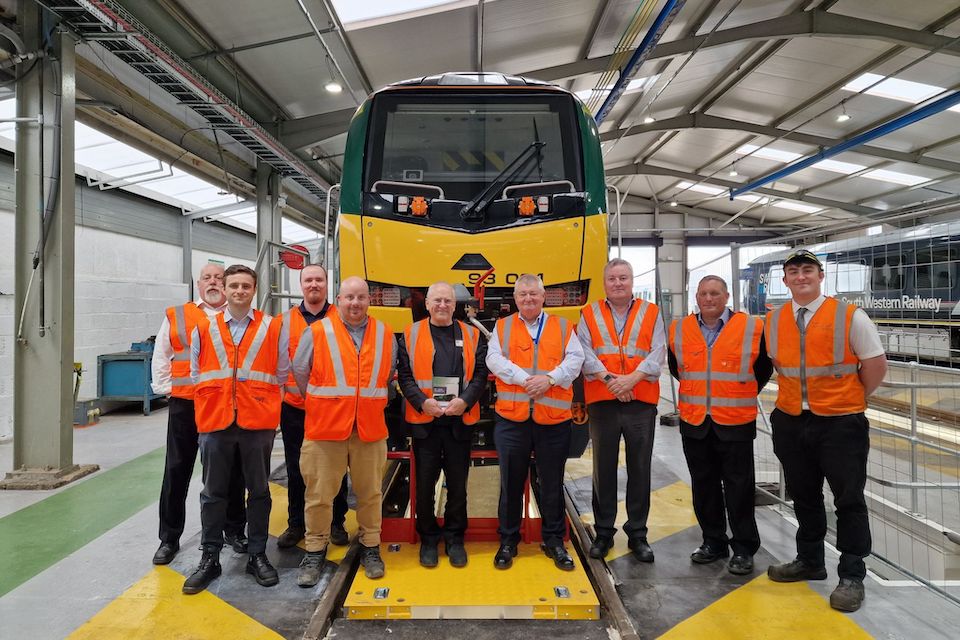 ROG executives and dignitaries pose with the new class 93 at Worksop