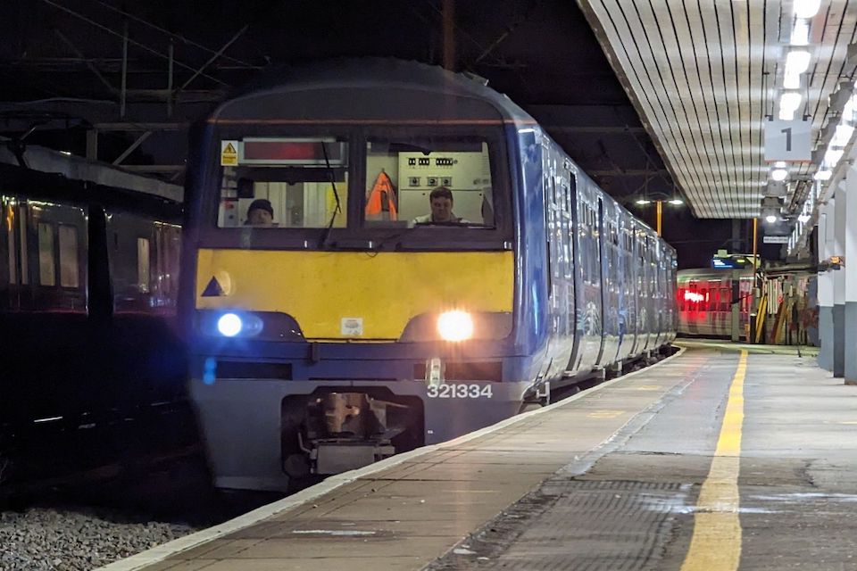 Head on view of Class 321 EMU ready to depart from platform at Birmingham International
