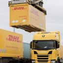 Gantry crane lands DHL container from train to truck