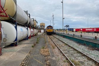 Looking down an Industrial siding towards a GBRf train at Aggregate Industries Purfleet in Essex