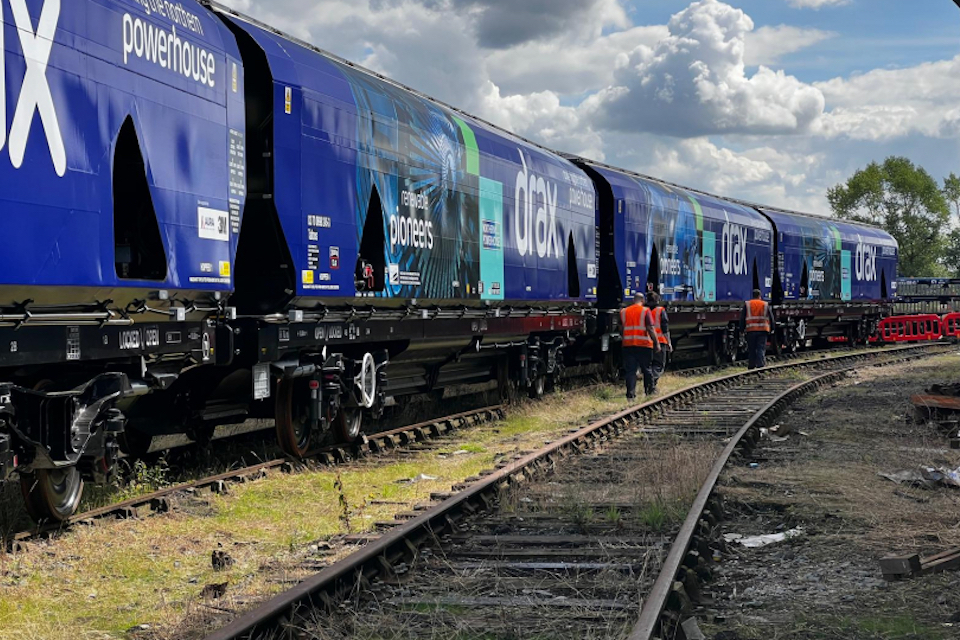 line of biomass hopper wagons liveried for Drax, ready to depart from WH Davis works in Mansfield