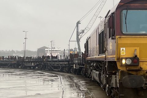Close up of the locomotive end of a train of metals wagons on the quayside at Sunderland