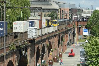 Freight and passenger services cross on the Castlefield Corridor